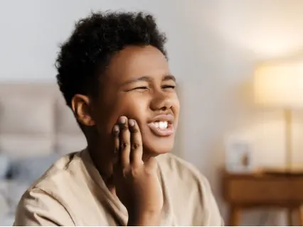 Toothache in Children row 1 - Kid Grins is Who You Need.webp