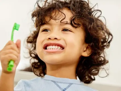 How to Brush Your Childs Teeth Row ! - At Kid Grins We Show You How.webp