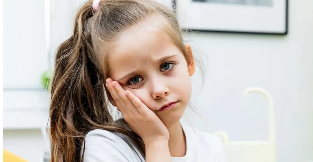 What to Do If Your Child Has a Toothache - Kid grins